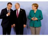 Президентът на РФ Владимир Путин, Меркел и Макрон